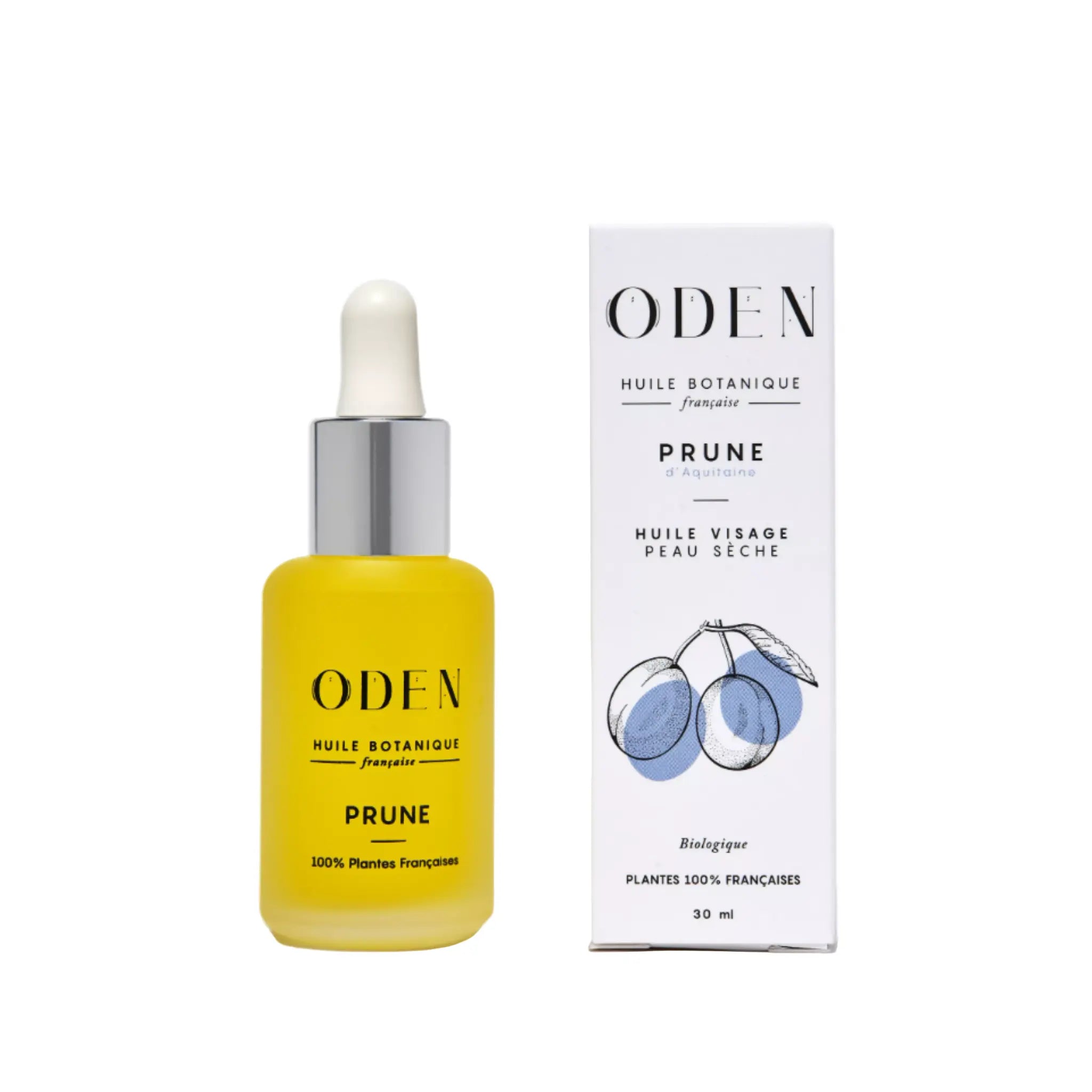 Yellow bottle of Oden Prune facial oil with its packaging on a white background, frontal.