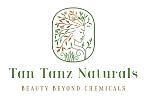 Logo of Tan Tanz Naturals with a stylized face and leaves on a white background