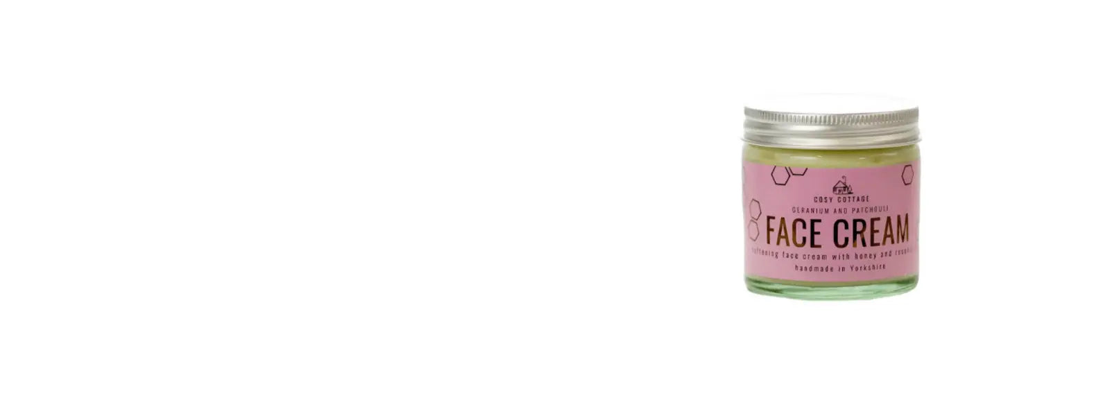 Made for life organics jar of replenish and protect daily moisturing balm. purple jar with a silver lid and wooden spoon on a white background.