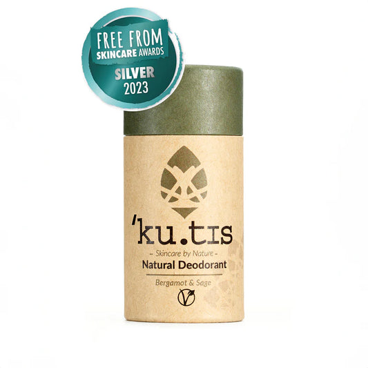 Kutis natural deodorant with a silver award badge on a white background, green lid on, front. 

