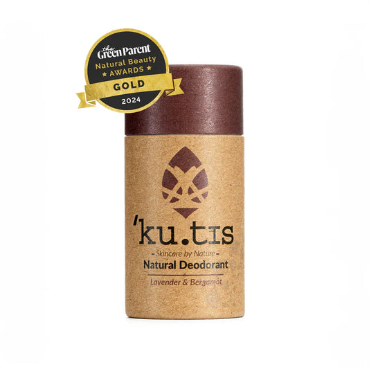 Kutis natural deodorant with a gold award badge on a white background, lid on, front view, brown lid