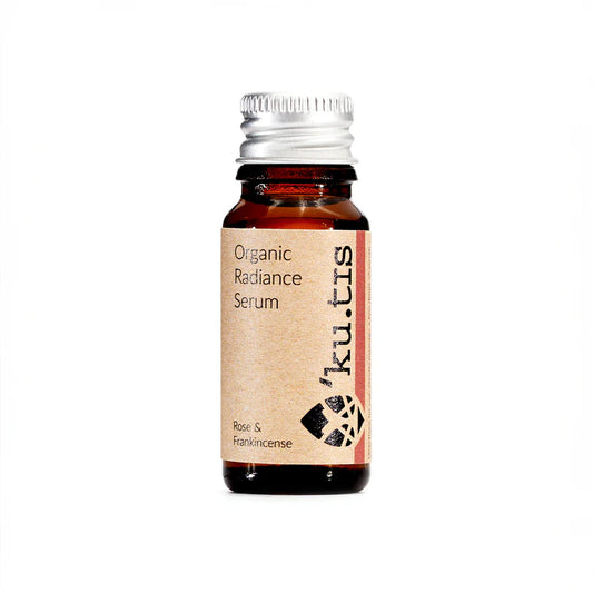 Organic Radiance Serum bottle with 'kutis' branding on a white background, front