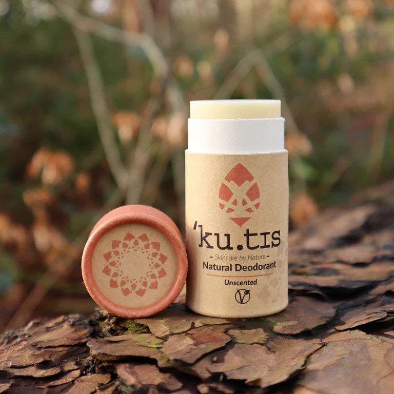 Kutis Unscented Vegan Natural Deodorant, front view, grassy background, lid off