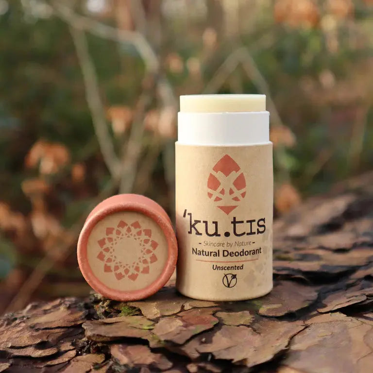 Kutis Unscented Vegan Natural Deodorant, front view, grassy background, lid off