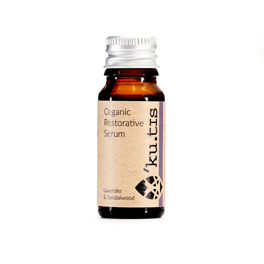 Kutis Organic Restorative face serum bottle with brown label on white background