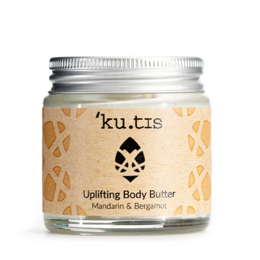 Jar of 'ku.tis' uplifting body butter with a white background