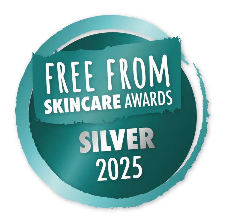 Silver award badge from Free From Skincare Awards 2025 on a teal background