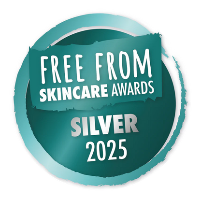 Silver award badge from Free From Skincare Awards 2025 on a teal background