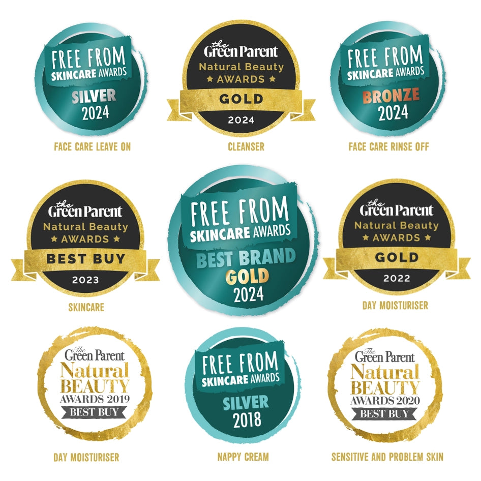 Collection of awards and badges for a skincare brand on a white background