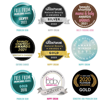 Collection of awards and badges for skincare and baby products on a white background