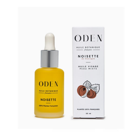 Yellow bottle with dropper and white box labeled 'ODEN' on a white background