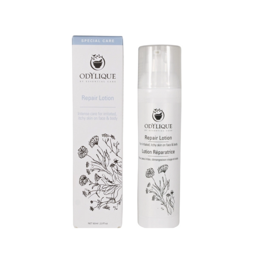Odylique repair lotion bottle and packaging on a white background