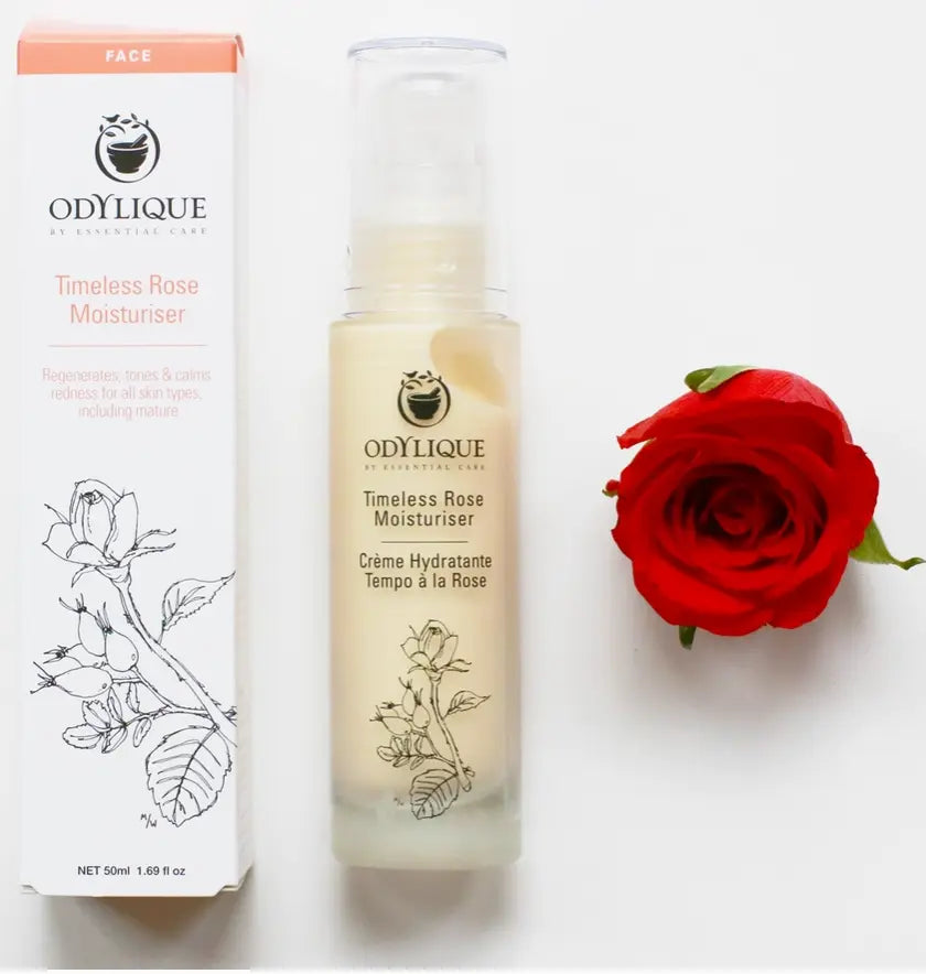 Odylique Timeless Rose Moisturizer with packaging and a red rose on a white background