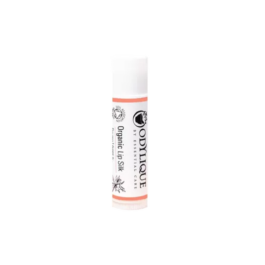 Organic Lip balm stick with odylique by essential care branding. white background. front view.

