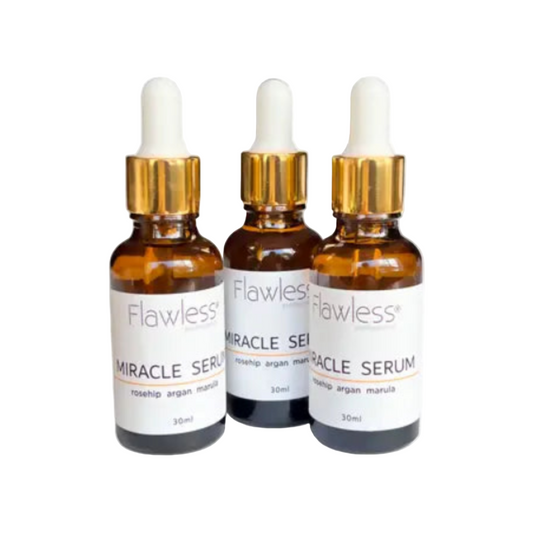 Three bottles of Flawless Miracle Serum with droppers on a white background, front
